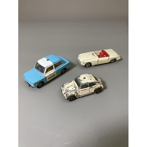 82 - A collection of assorted vintage diecast model vehicles to include Corgi Volkswagen 1200 saloon, Les... 