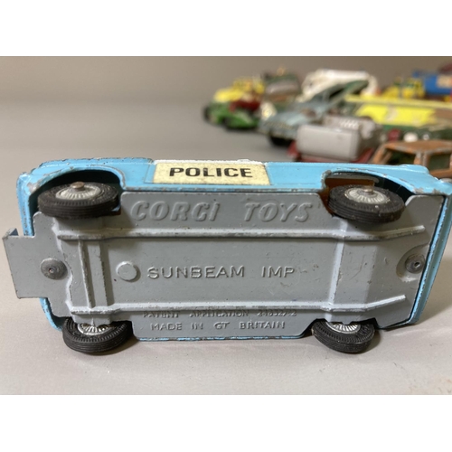 82 - A collection of assorted vintage diecast model vehicles to include Corgi Volkswagen 1200 saloon, Les... 