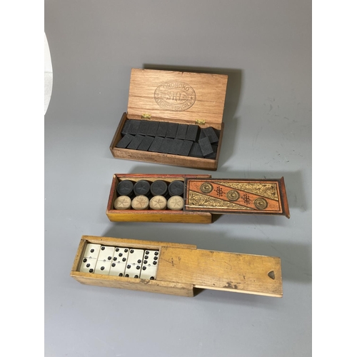 84 - Three vintage wooden boxes, two sets of dominoes and one of draught pieces