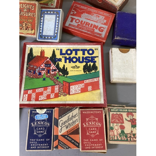 85 - A large collection of assorted vintage games to include Jaques & Son Tiddledy Winks, Railway Race, p... 