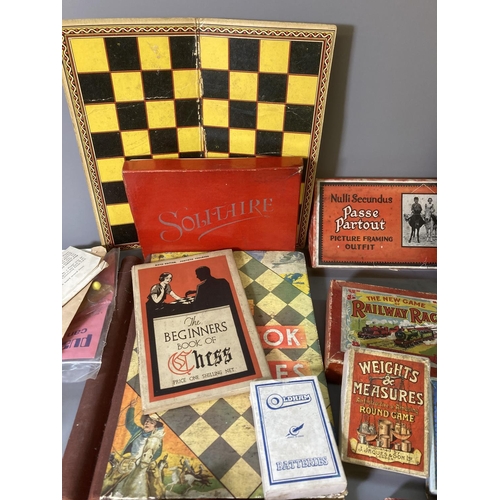 85 - A large collection of assorted vintage games to include Jaques & Son Tiddledy Winks, Railway Race, p... 