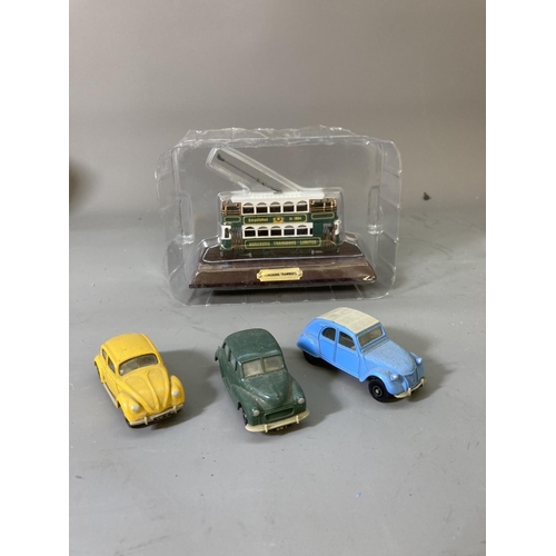 86 - A collection of assorted model vehicles to include Matchbox jeep, Lledo Lyons Tetley Sunshine coach,... 