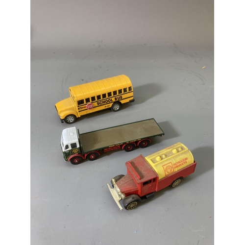 86 - A collection of assorted model vehicles to include Matchbox jeep, Lledo Lyons Tetley Sunshine coach,... 