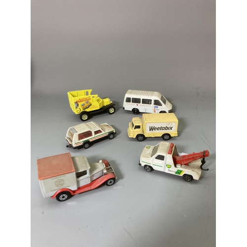 86 - A collection of assorted model vehicles to include Matchbox jeep, Lledo Lyons Tetley Sunshine coach,... 