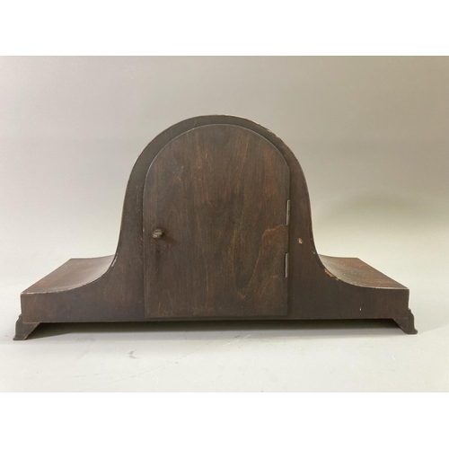 218 - A mid 20th century mahogany cased chiming mantel clock with pendulum - approx. 23cm high x 43cm wide... 