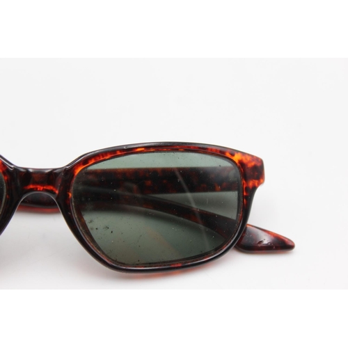 132 - A cased pair of vintage Bausch & Lomb Ray-Ban red tortoiseshell effect sunglasses