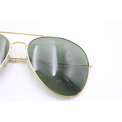 140 - A cased pair of unisex Ray-Ban gold tone large aviator style sunglasses