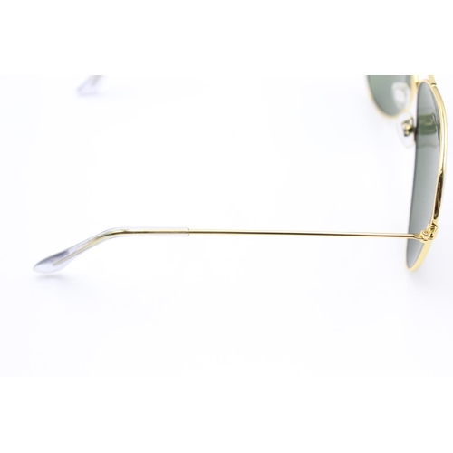 140 - A cased pair of unisex Ray-Ban gold tone large aviator style sunglasses