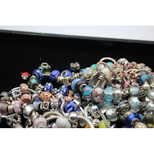 142 - Forty two retro fashion charm bracelets