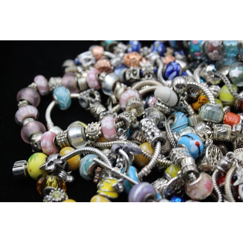 142 - Forty two retro fashion charm bracelets