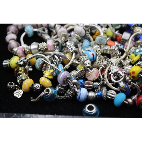 142 - Forty two retro fashion charm bracelets