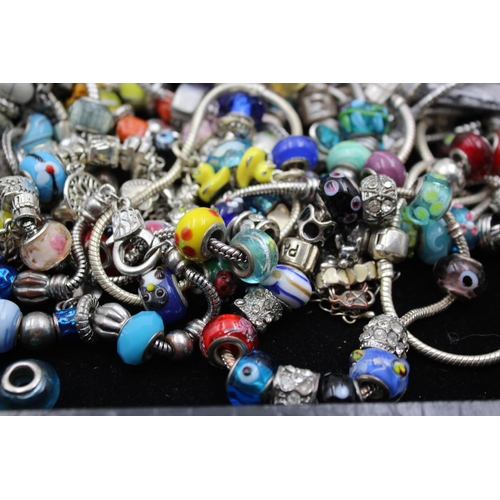 142 - Forty two retro fashion charm bracelets