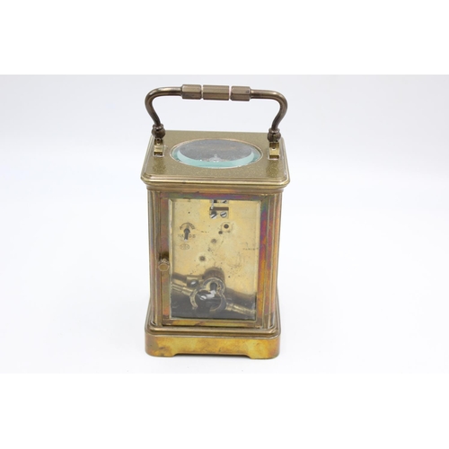 213 - A vintage heavy brass cased key wind carriage clock - approx. 12.5cm x 8.5cm x 7.5cm