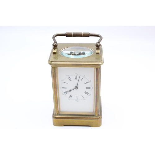 213 - A vintage heavy brass cased key wind carriage clock - approx. 12.5cm x 8.5cm x 7.5cm