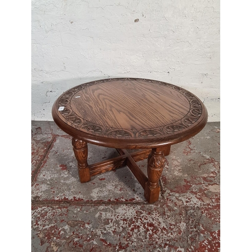 416 - A Jay-Cee solid oak circular coffee table - approx. 47cm high x 75cm diameter