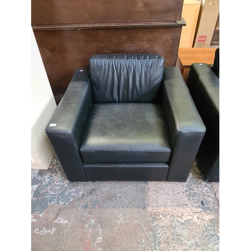 422 - A modern black leather two piece lounge suite comprising armchair - approx. 72cm high x 95cm wide x ... 