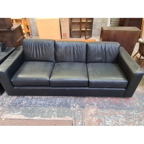 422 - A modern black leather two piece lounge suite comprising armchair - approx. 72cm high x 95cm wide x ... 