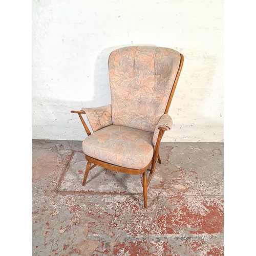 423 - An Ercol Evergreen Golden Dawn elm armchair - approx. 104cm high x 74cm wide x 60cm deep