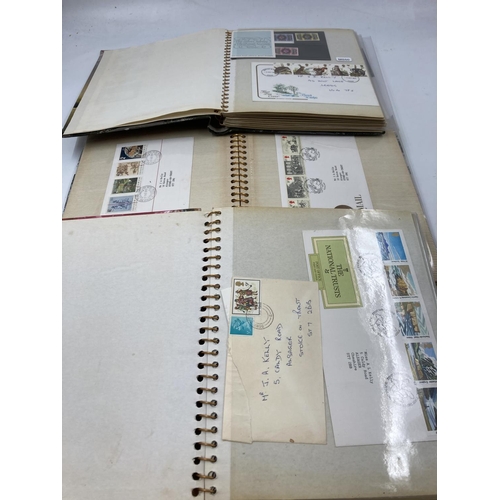 170 - Three albums containing assorted First Day covers to include British gardens, London economic summit... 