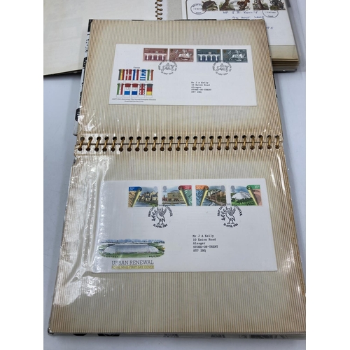 170 - Three albums containing assorted First Day covers to include British gardens, London economic summit... 