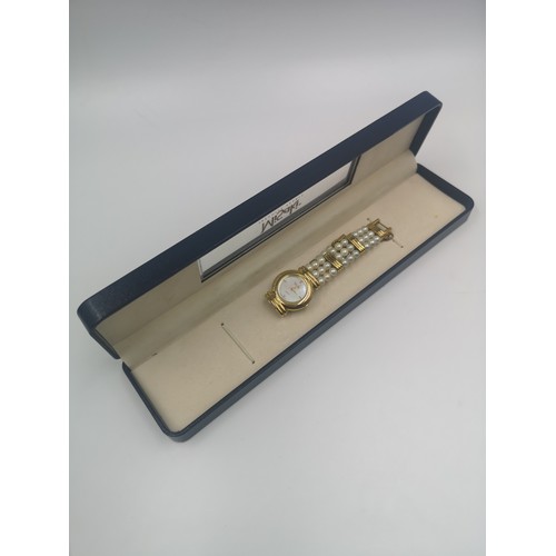 1257 - A boxed Misaki Japanese pearl and gold plated quartz wristwatch with mother of pearl dial