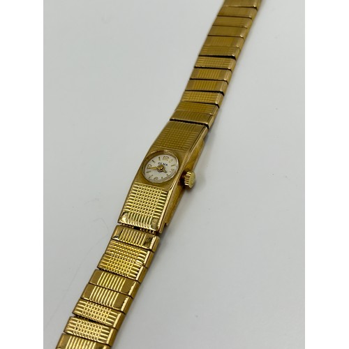 1261 - A vintage Olma 9ct gold lady's mechanical wristwatch with 9ct gold strap - approx. 25.89 grams