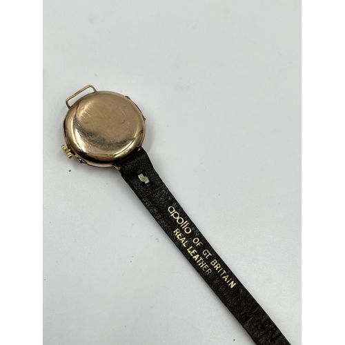 1249 - A 1930s stamped 9ct gold cased lady's mechanical wristwatch with white enamel face and sub second di... 