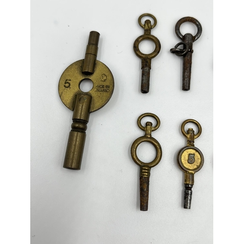 1251 - A collection of nine antique pocket watch and carriage clock keys