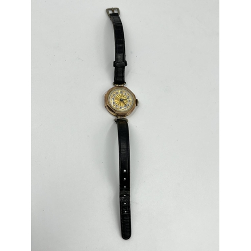 1252 - A 1930s Marbla 9ct gold cased mechanical wristwatch with black leather strap - approx. gross weight ... 