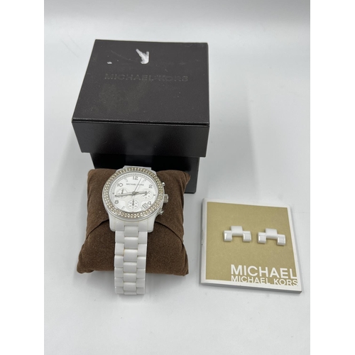 1259 - A boxed Michael Kors men's quartz wristwatch with ceramic bracelet and dial - model no. MK-5188