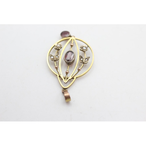 2002 - A late Victorian/Edwardian 9ct gold garnet and seed pearl lavalier pendant - approx. gross weight 1.... 