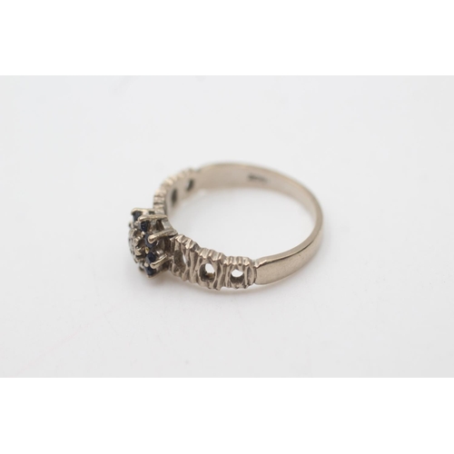 2010 - An 18ct white gold diamond and sapphire cluster tree bark texture ring, size N½ - approx. gross weig... 