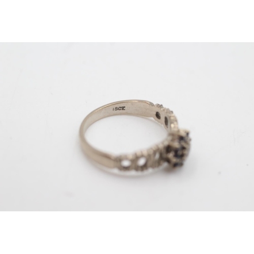 2010 - An 18ct white gold diamond and sapphire cluster tree bark texture ring, size N½ - approx. gross weig... 