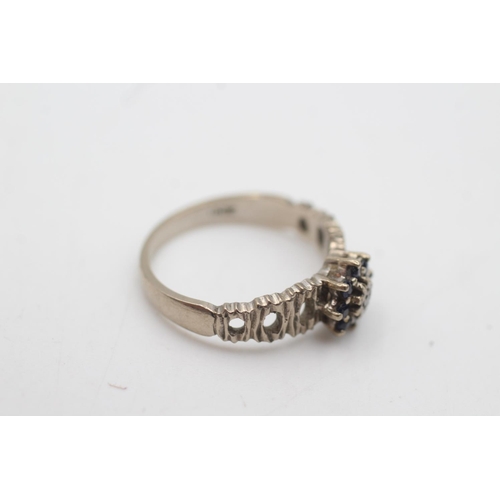 2010 - An 18ct white gold diamond and sapphire cluster tree bark texture ring, size N½ - approx. gross weig... 