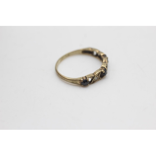 2011 - A 9ct gold sapphire and diamond half eternity ring, size M - approx. gross weight 1.2 grams