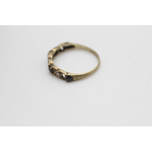 2011 - A 9ct gold sapphire and diamond half eternity ring, size M - approx. gross weight 1.2 grams