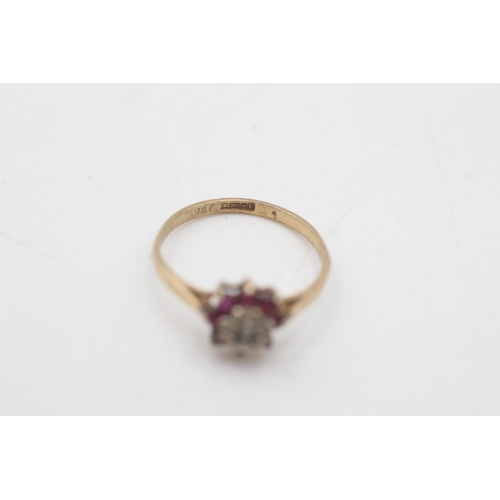 2015 - A hallmarked Birmingham 9ct gold diamond and ruby floral halo set ring, size L½ - approx. gross weig... 