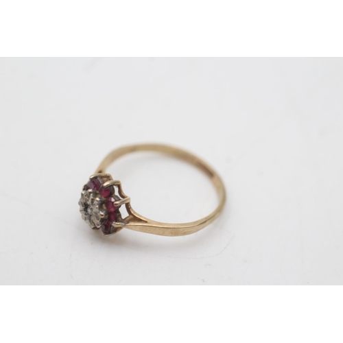 2015 - A hallmarked Birmingham 9ct gold diamond and ruby floral halo set ring, size L½ - approx. gross weig... 