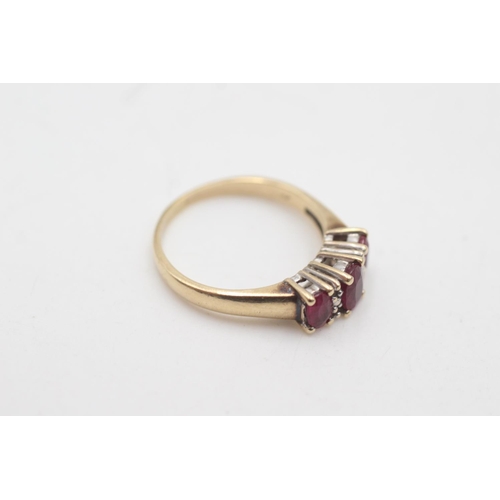 2018 - A 14ct gold ruby and diamond seven stone dress ring, size Q - approx. gross weight 4.1 grams