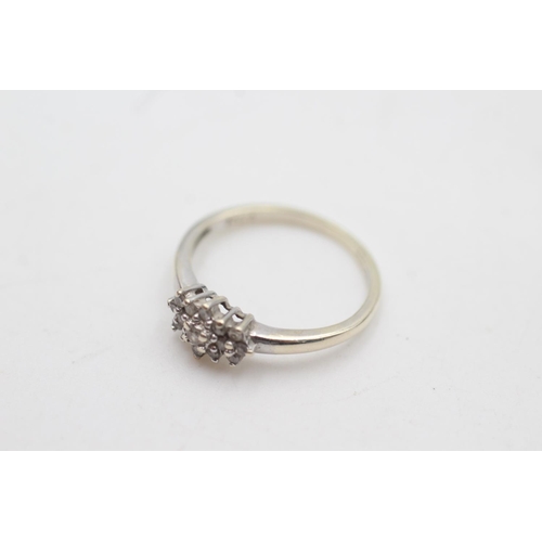 2019 - A 9ct white diamond cluster dress ring, size J½ - approx. gross weight 1.5 grams