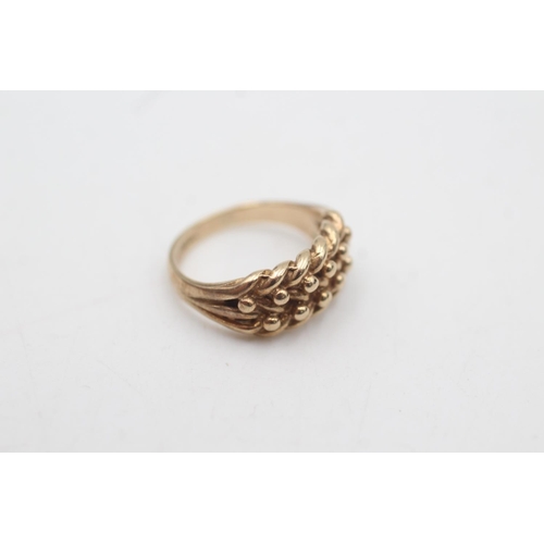 2020 - A hallmarked Birmingham 9ct gold keeper ring, size E½ - approx. gross weight 3 grams