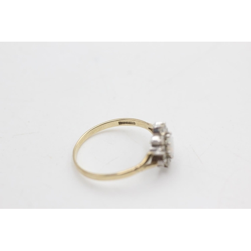 2021 - A 9ct gold opal and clear gemstone halo set ring, size S½ - approx. gross weight 1.6 grams