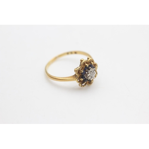 2022 - An 18ct gold diamond and sapphire ornate floral halo setting ring, size O½ - approx. gross weight 3 ... 