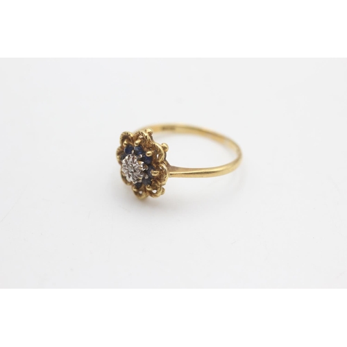 2022 - An 18ct gold diamond and sapphire ornate floral halo setting ring, size O½ - approx. gross weight 3 ... 