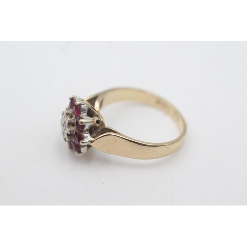 2026 - A hallmarked London 9ct gold diamond and ruby floral halo dress ring, size N½ - approx. gross weight... 