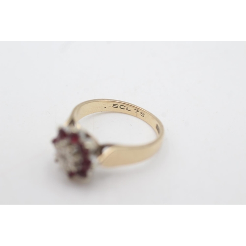 2026 - A hallmarked London 9ct gold diamond and ruby floral halo dress ring, size N½ - approx. gross weight... 