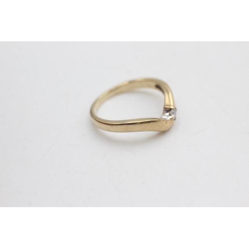 2033 - A hallmarked Sheffield 9ct gold diamond solitaire wishbone ring, size K½ - approx. gross weight 2.3 ... 