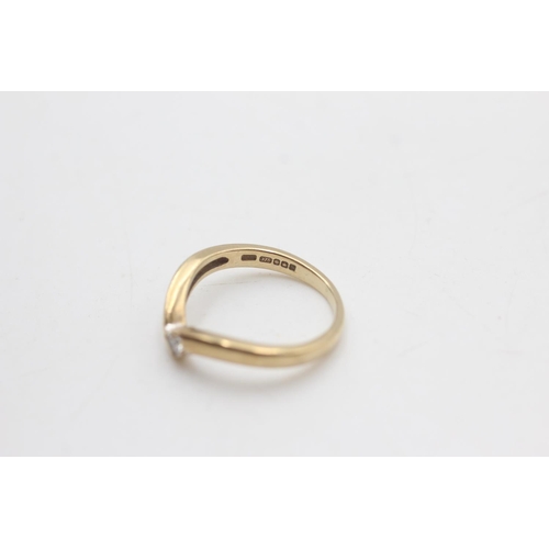 2033 - A hallmarked Sheffield 9ct gold diamond solitaire wishbone ring, size K½ - approx. gross weight 2.3 ... 