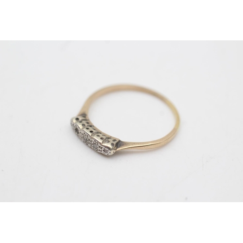 2037 - A 9ct gold and platinum diamond five stone ring, size T½ - approx. gross weight 1.9 grams