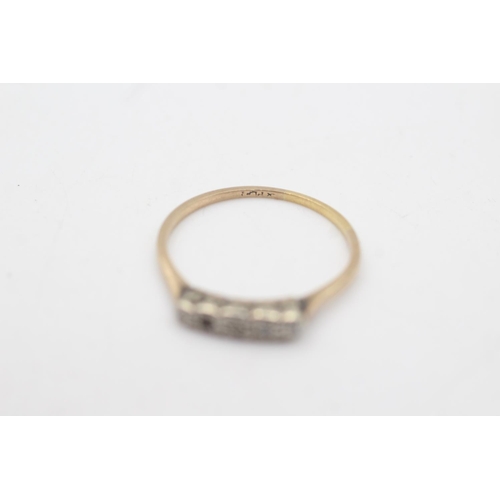 2037 - A 9ct gold and platinum diamond five stone ring, size T½ - approx. gross weight 1.9 grams